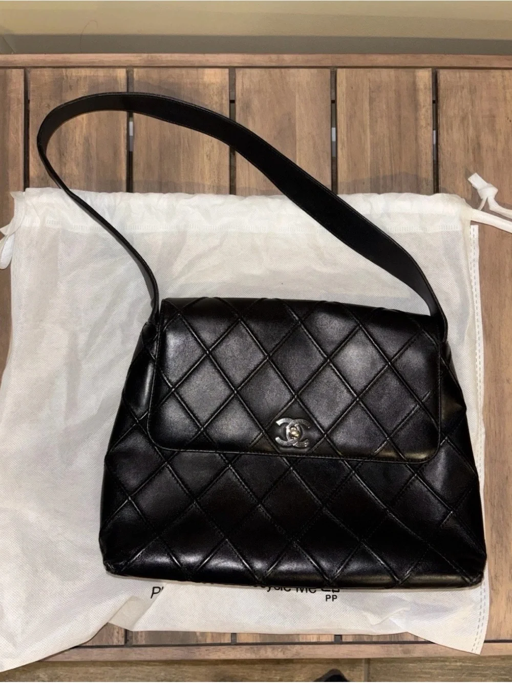 CHANEL Black Quilted Leather Shoulder Bag with Silver CC Hardware